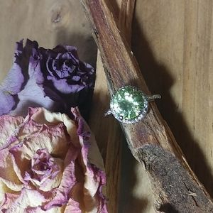 Peridot colored faux Diamond setting ring